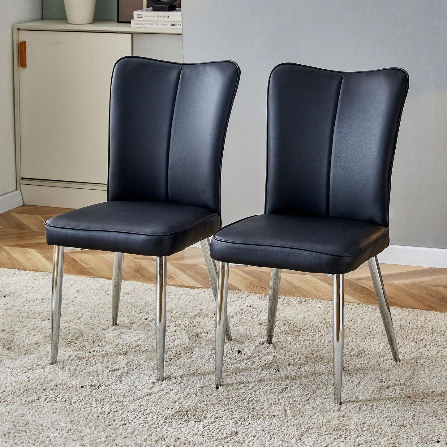 Modern Minimalist Dining Chairs Set of 2 Black PU Leather Curved Backrest with Metal Legs for Restaurants Bedrooms Living Rooms
