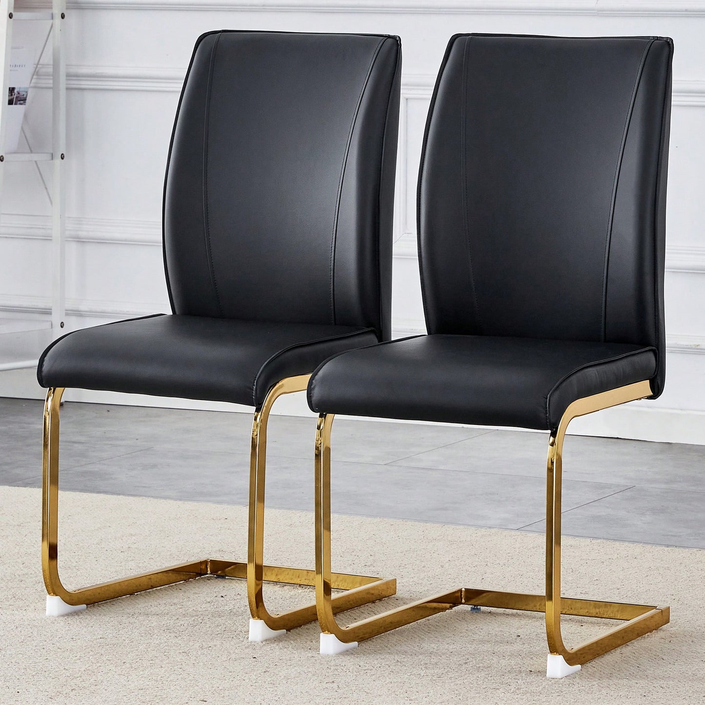 Elegant Black PU Dining Chairs Set Of 2 High Resilience With Arched Gold Metal Legs