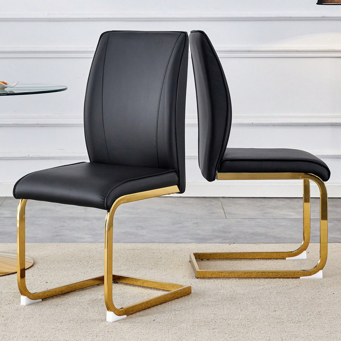 Elegant Black PU Dining Chairs Set Of 2 High Resilience With Arched Gold Metal Legs
