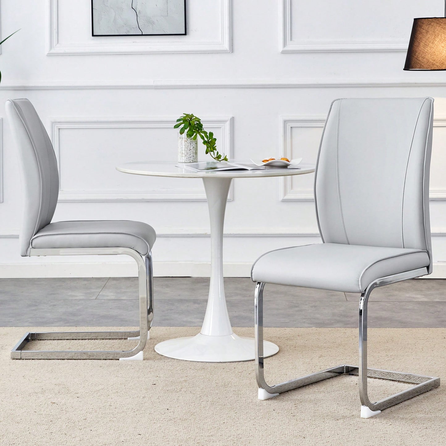 Elegant Black PU Dining Chairs With High Resilience And Arched Silver Metal Legs - Set Of 2