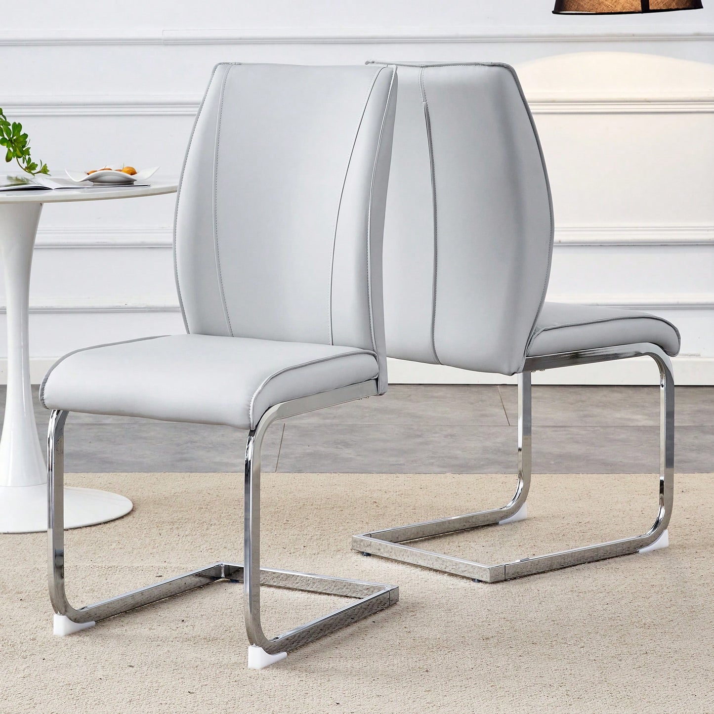 Elegant Black PU Dining Chairs With High Resilience And Arched Silver Metal Legs - Set Of 2