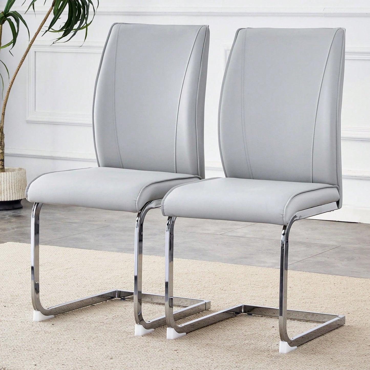 Elegant Black PU Dining Chairs With High Resilience And Arched Silver Metal Legs - Set Of 2