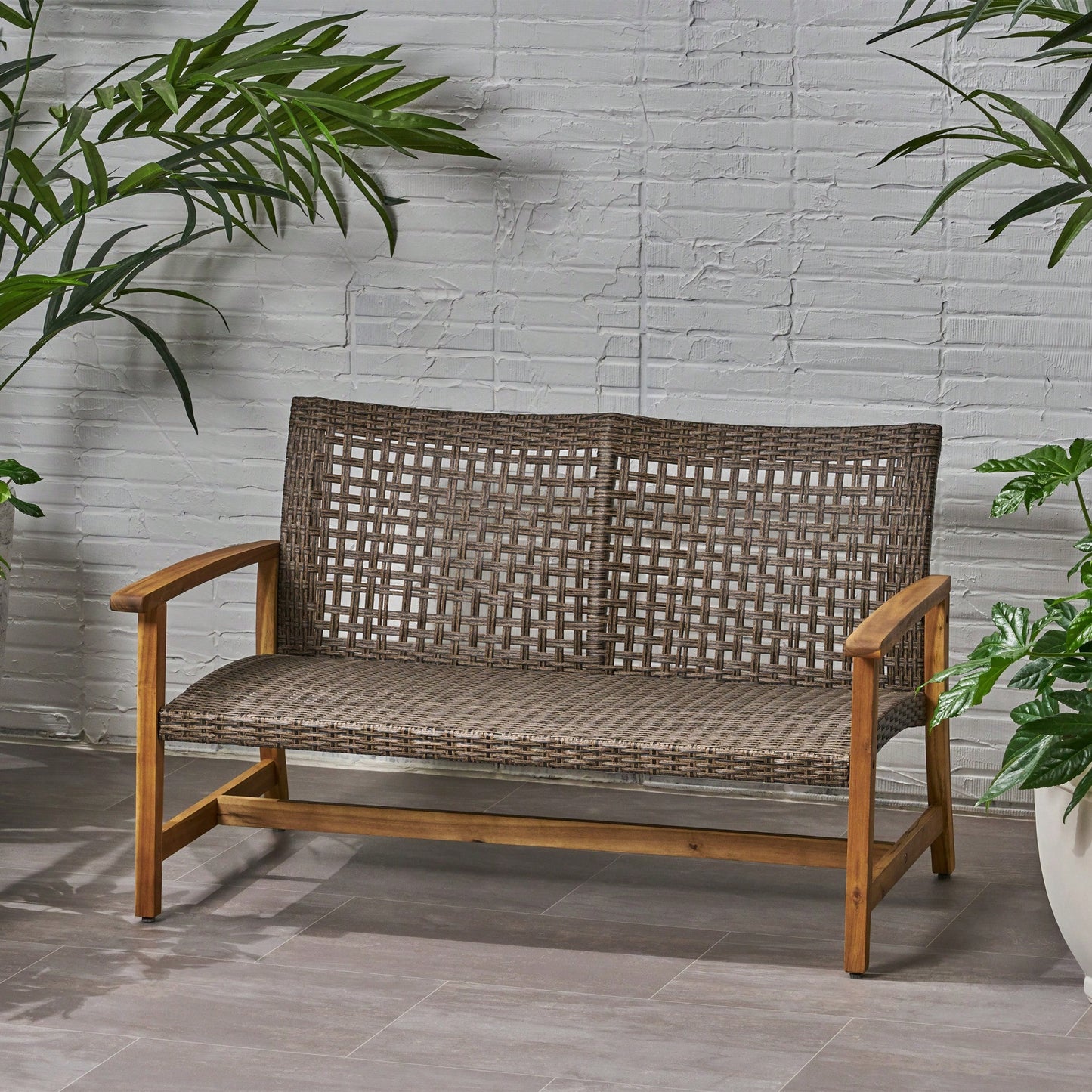 Cozy Outdoor Wicker Loveseat With Plush Cushions For Relaxing Patio Seating