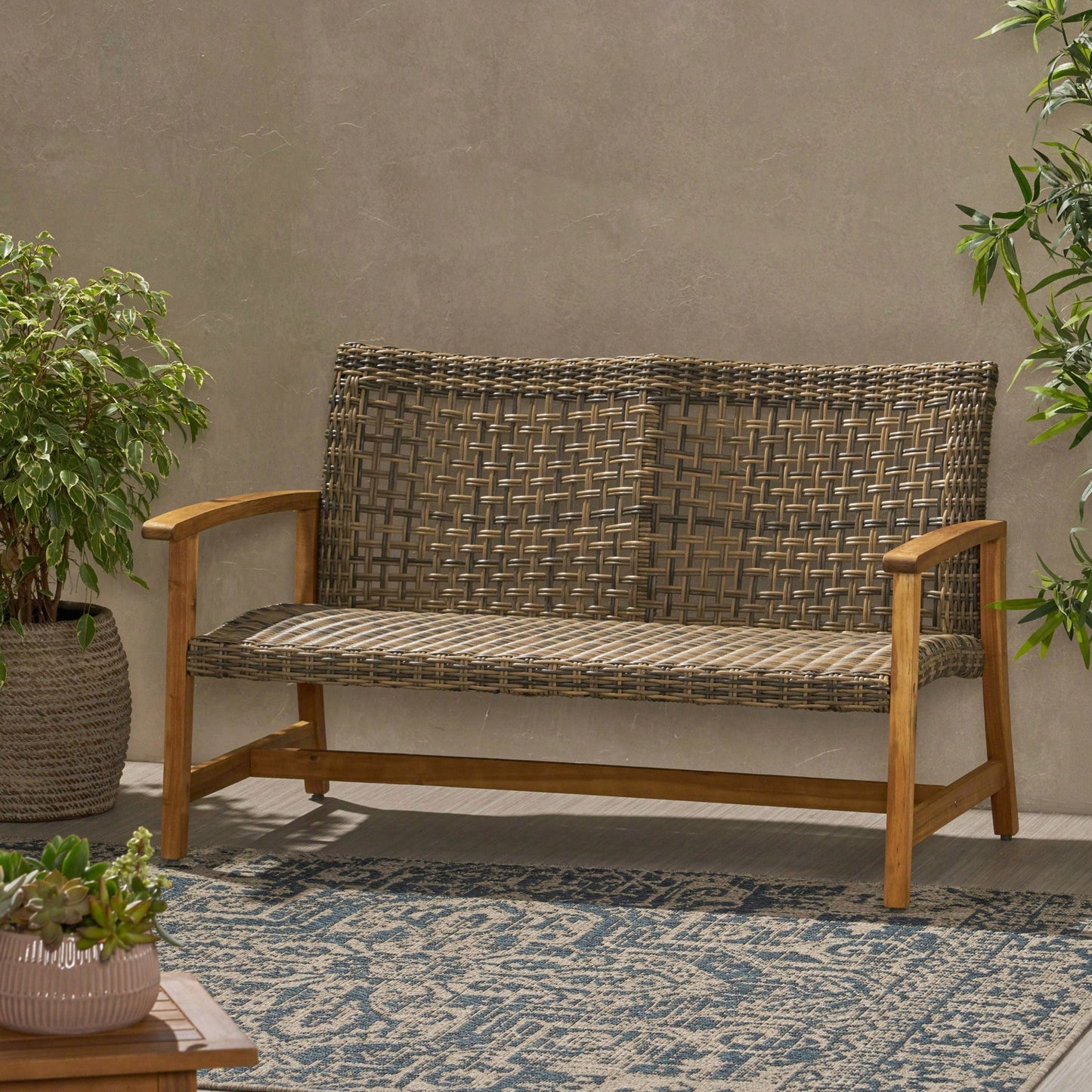 Cozy Outdoor Wicker Loveseat With Plush Cushions For Relaxing Patio Seating