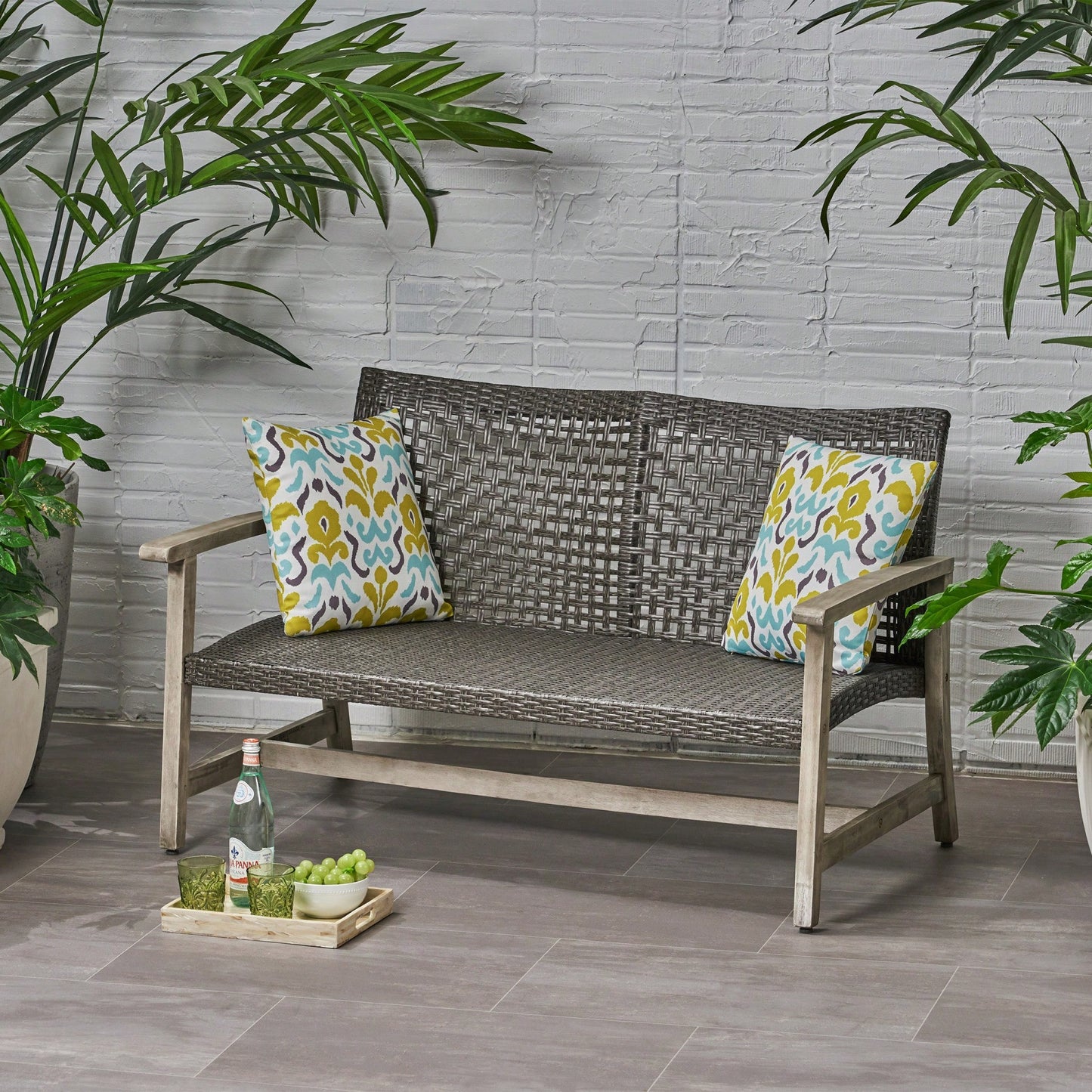 Cozy Outdoor Wicker Loveseat With Plush Cushions For Relaxing Patio Seating