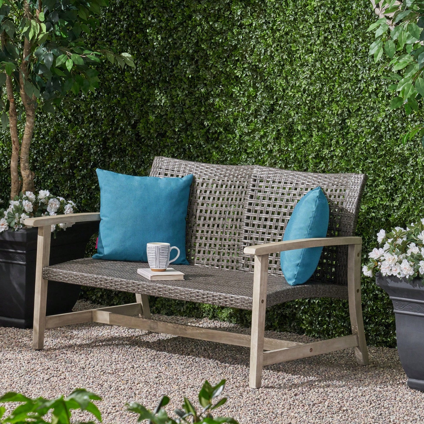 Cozy Outdoor Wicker Loveseat With Plush Cushions For Relaxing Patio Seating