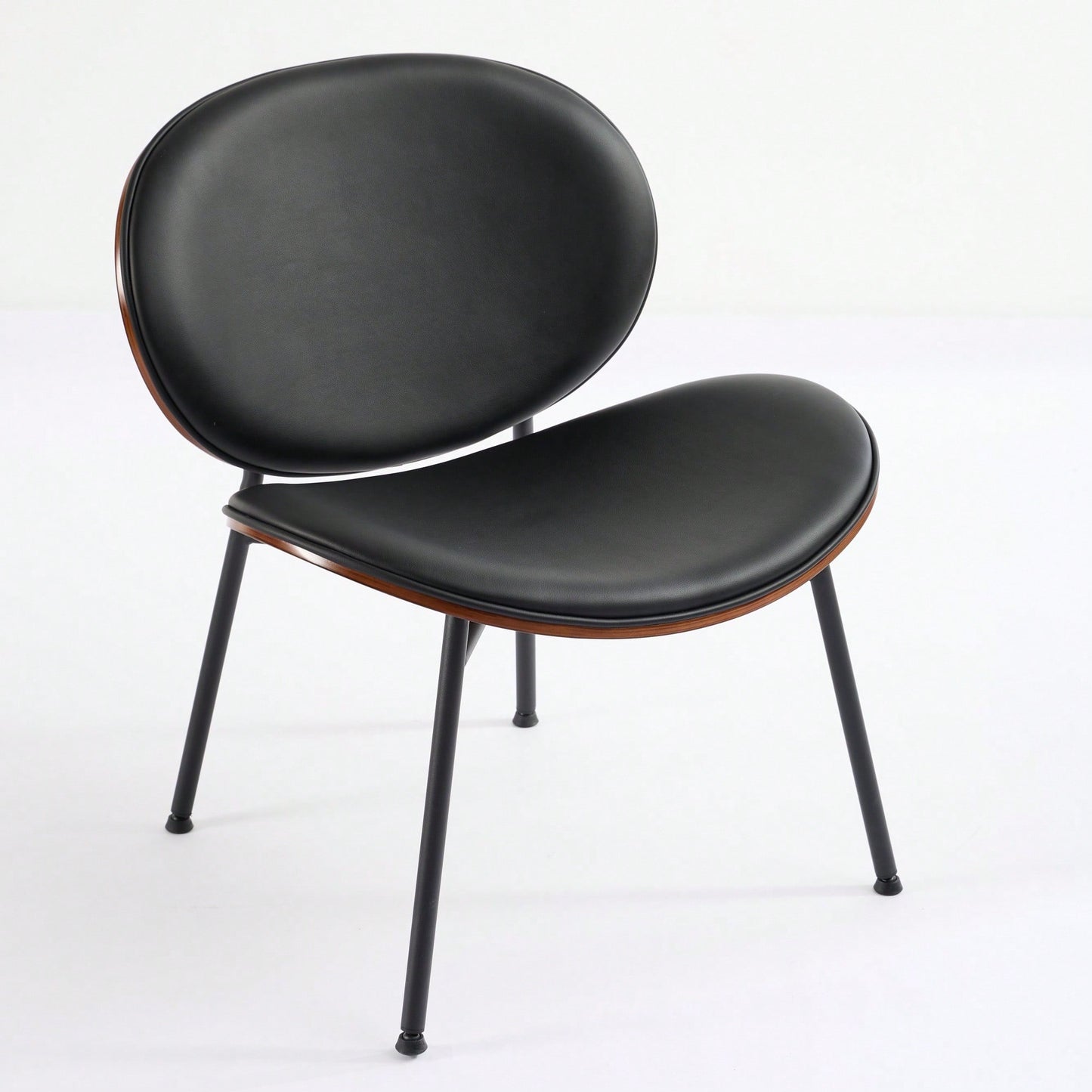 Mid-Century Modern Black Leather Lounge Chair With Walnut Finish Comfortable Backrest And Tripod Design