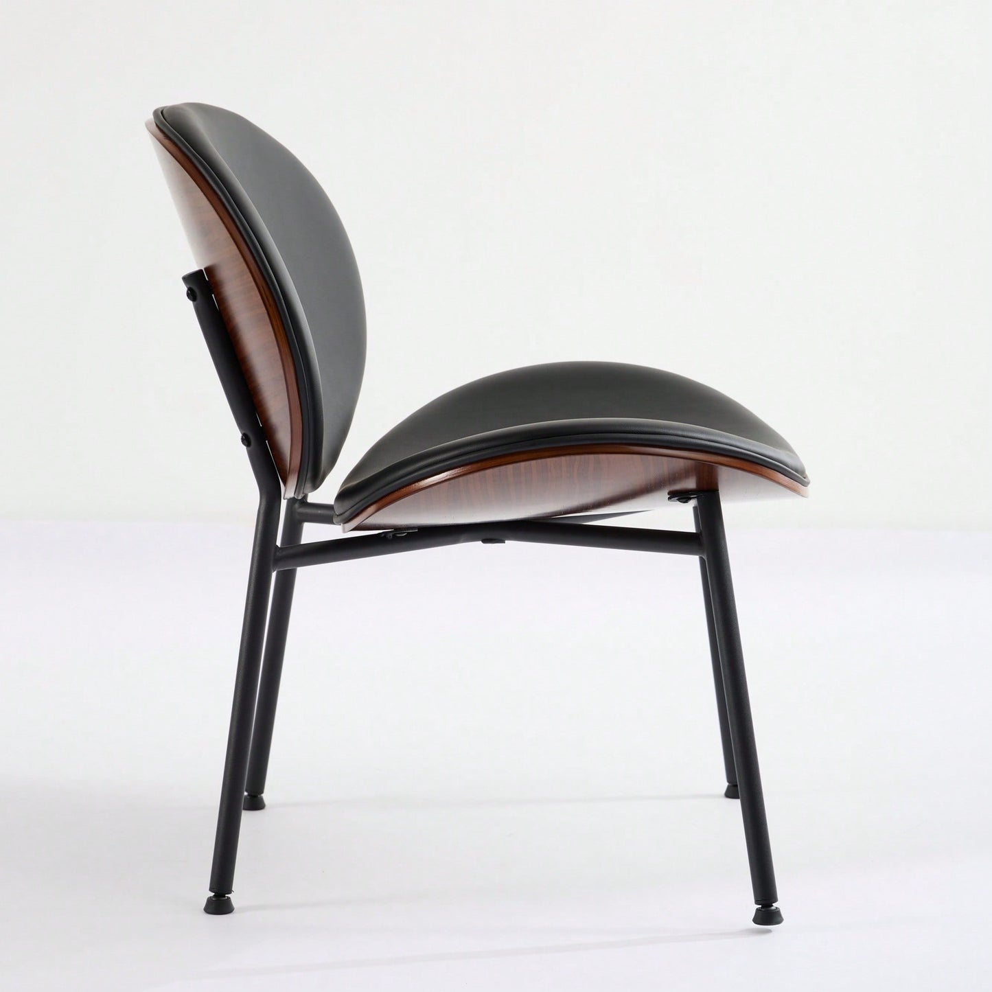 Mid-Century Modern Black Leather Lounge Chair With Walnut Finish Comfortable Backrest And Tripod Design