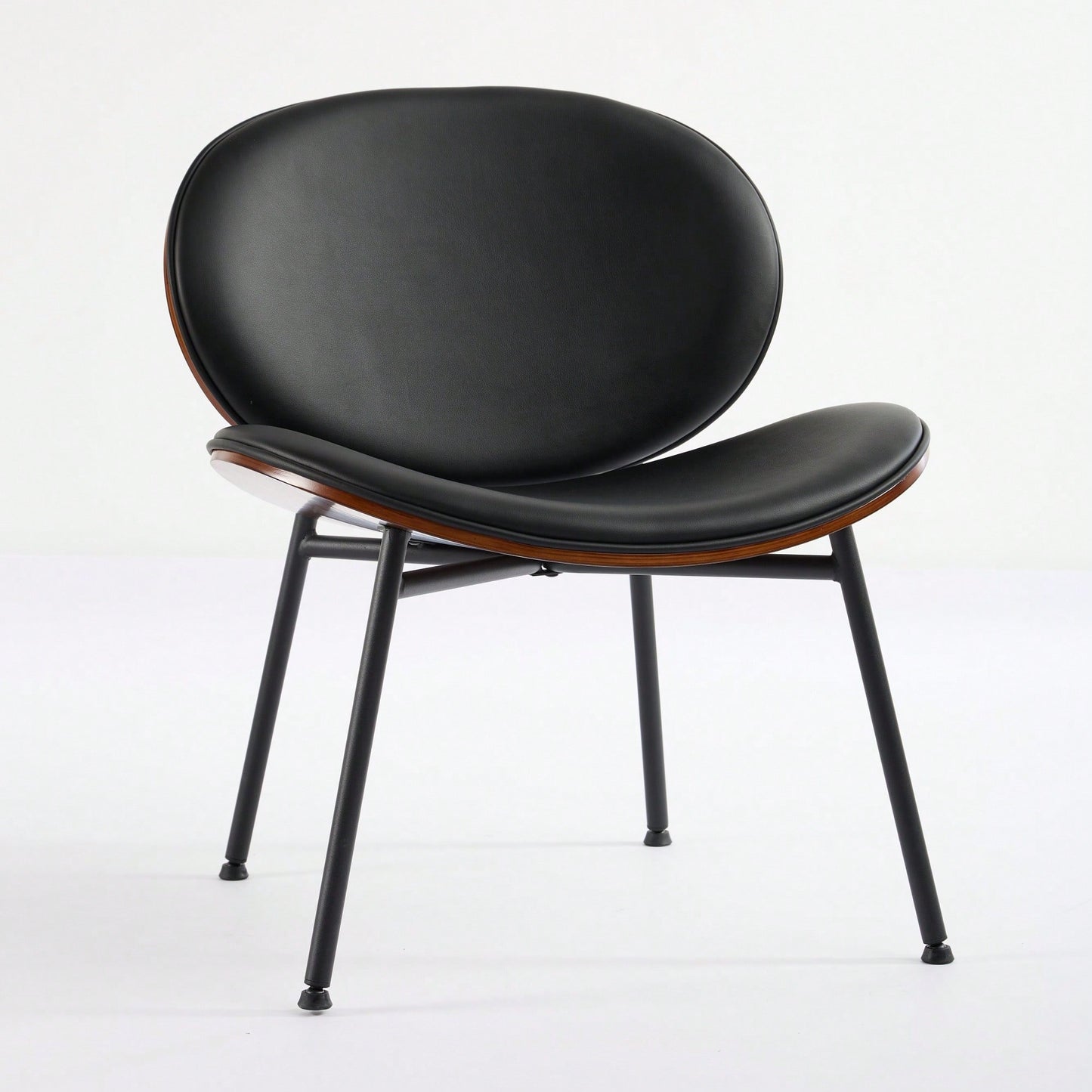 Mid-Century Modern Black Leather Lounge Chair With Walnut Finish Comfortable Backrest And Tripod Design