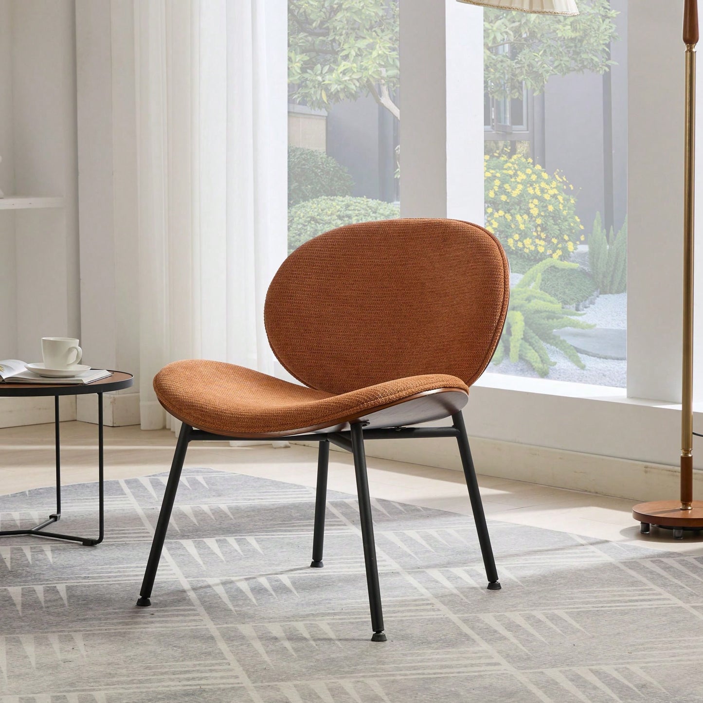 Mid-Century Modern Black Leather Lounge Chair With Walnut Finish Comfortable Backrest And Tripod Design
