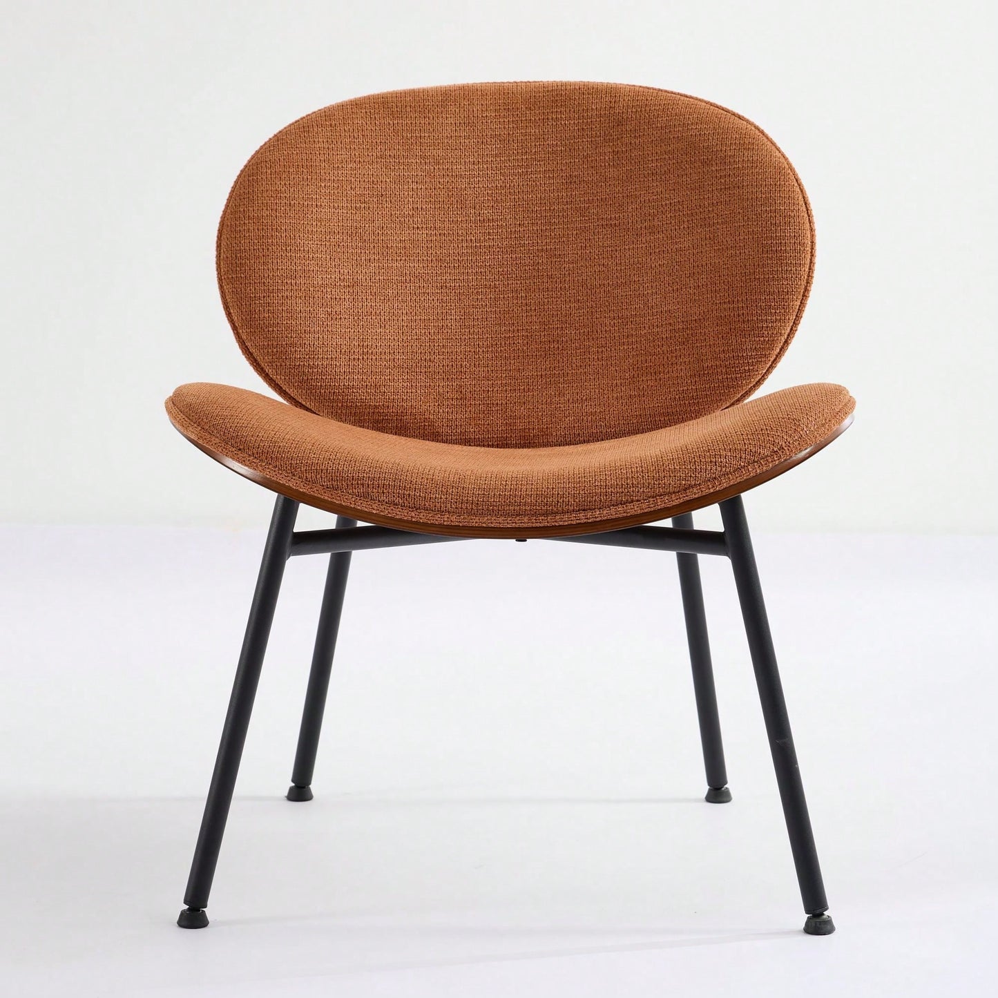 Mid-Century Modern Black Leather Lounge Chair With Walnut Finish Comfortable Backrest And Tripod Design