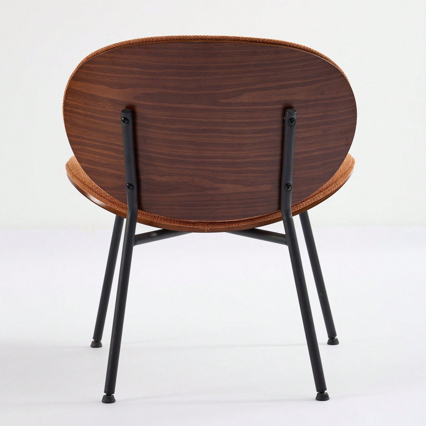 Mid-Century Modern Black Leather Lounge Chair With Walnut Finish Comfortable Backrest And Tripod Design