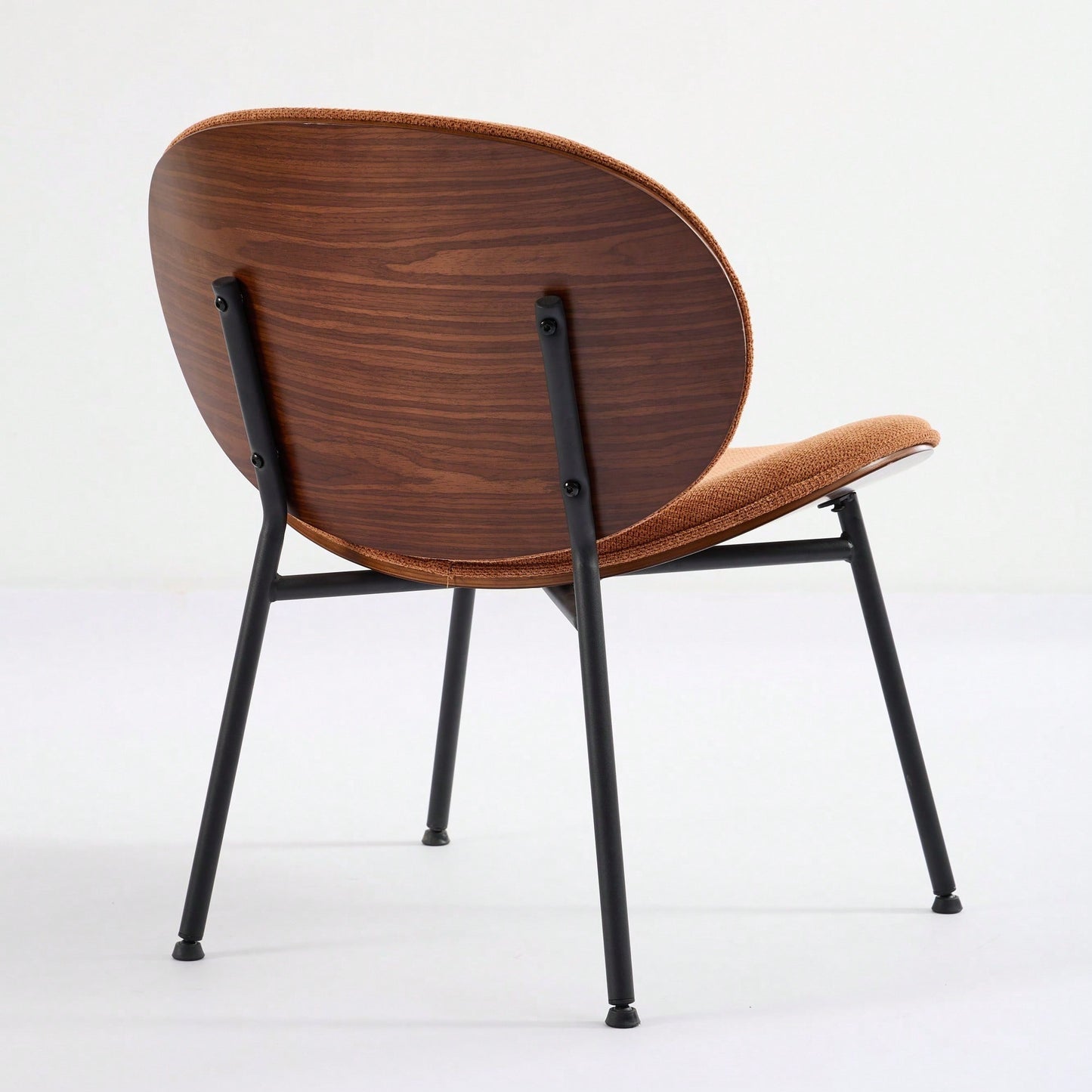 Mid-Century Modern Black Leather Lounge Chair With Walnut Finish Comfortable Backrest And Tripod Design