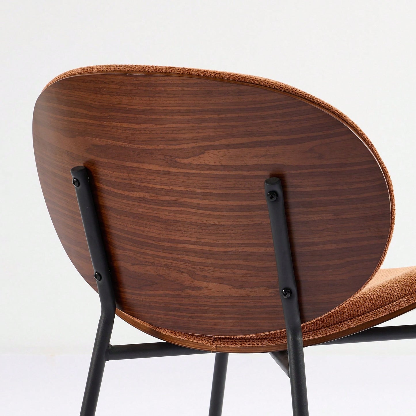 Mid-Century Modern Black Leather Lounge Chair With Walnut Finish Comfortable Backrest And Tripod Design