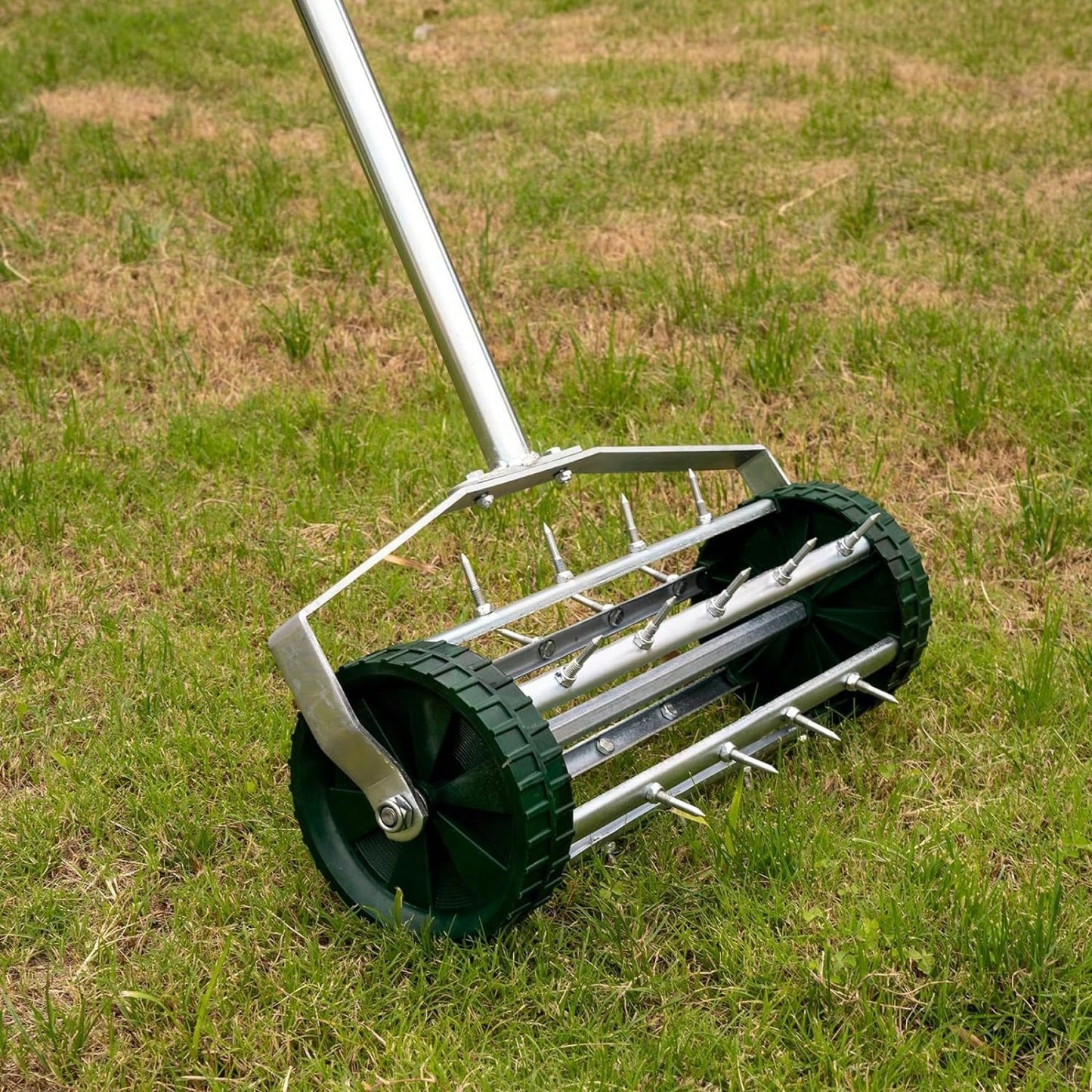 Heavy Duty Rotary Lawn Aerator with Long Steel Handle for Effective Soil Aeration and Grass Care