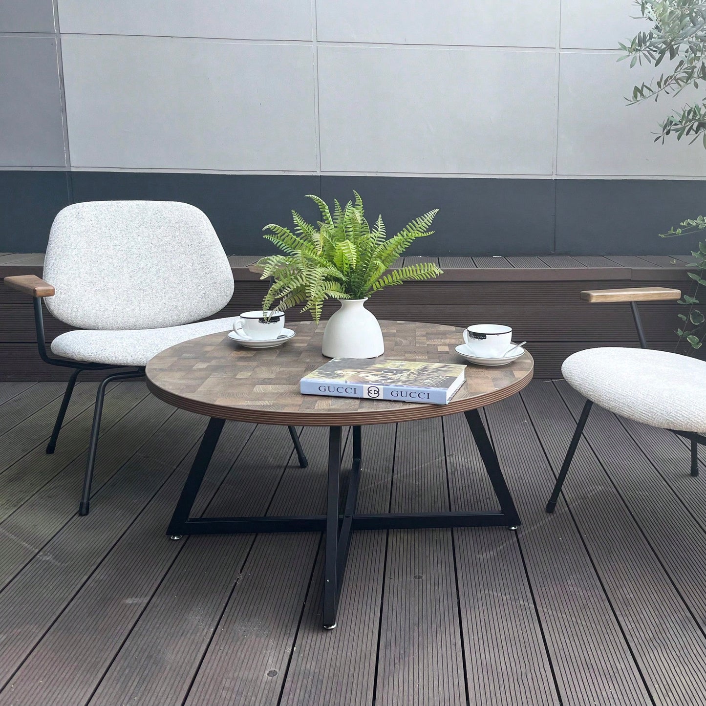 Round Coffee Table With Friendly Wood Grain Top And Sturdy Black Metal Frame For Modern Living Spaces