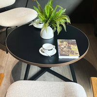 Round Coffee Table With Friendly Wood Grain Top And Sturdy Black Metal Frame For Modern Living Spaces