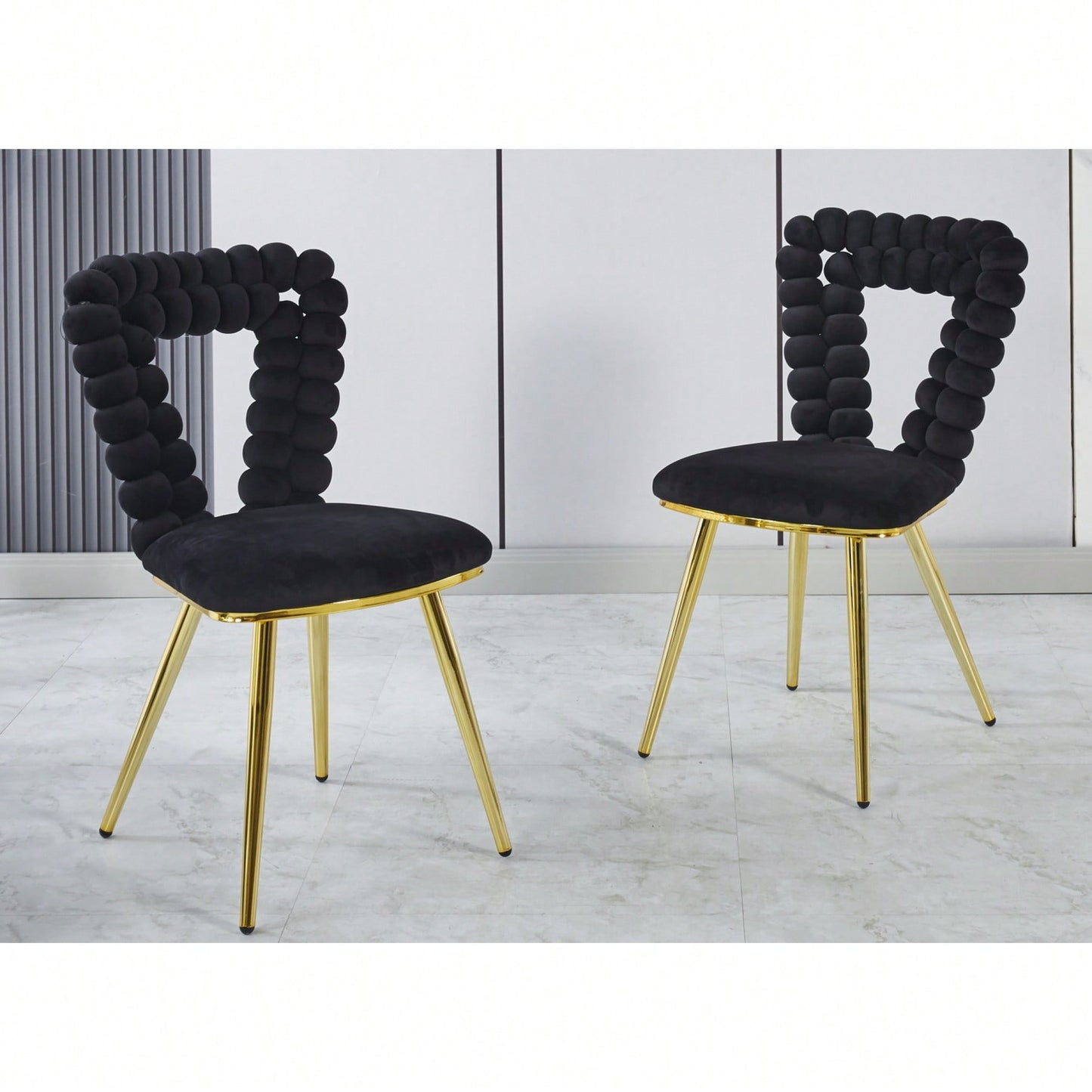 Stylish Set of 2 Modern Chairs with Gold Legs and Soft Black Cushions for Dining and Living Spaces