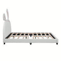 Elegant White Upholstered Leather Platform Bed With Rabbit Accent