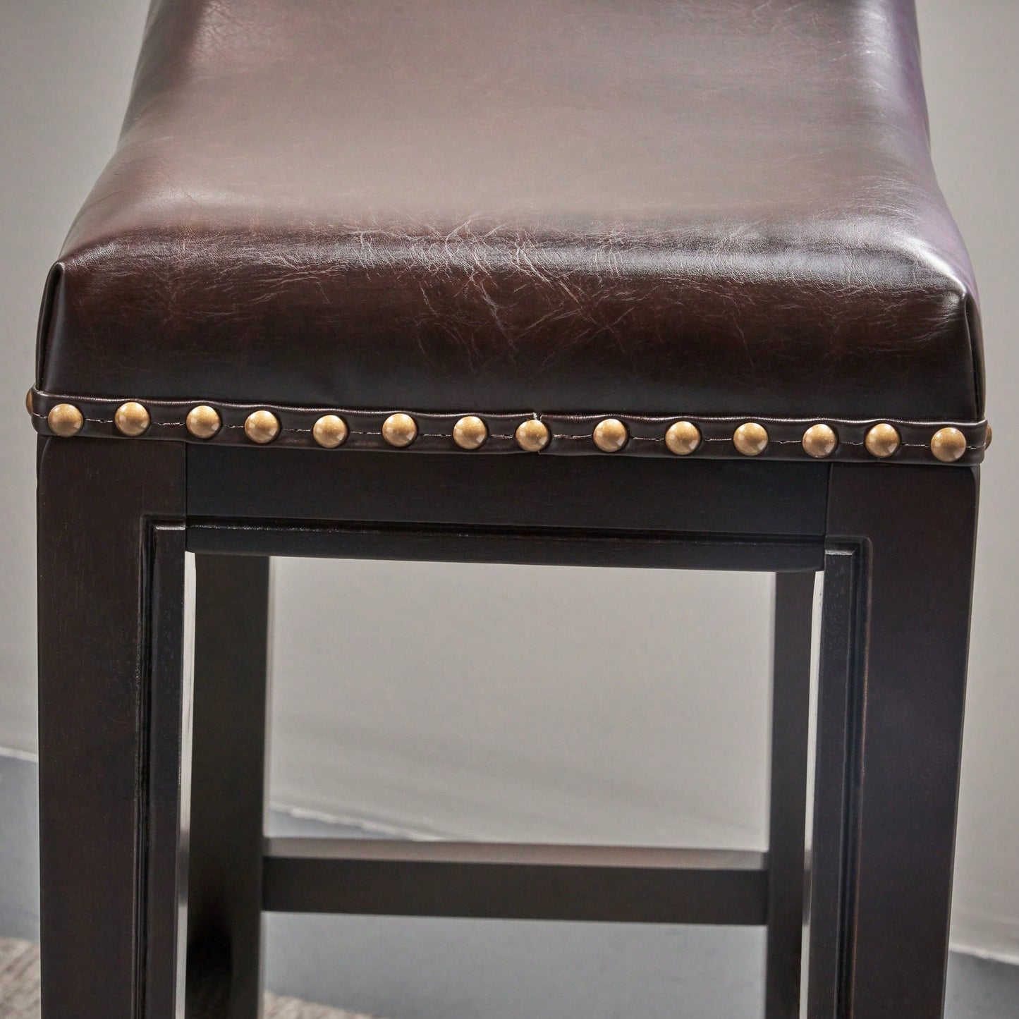 Elegant Upholstered Barstool With Studded Accents For Modern Dining Spaces