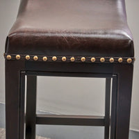 Elegant Upholstered Barstool With Studded Accents For Modern Dining Spaces