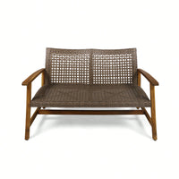 Cozy Outdoor Wicker Loveseat With Plush Cushions For Relaxing Patio Seating