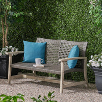 Cozy Outdoor Wicker Loveseat With Plush Cushions For Relaxing Patio Seating