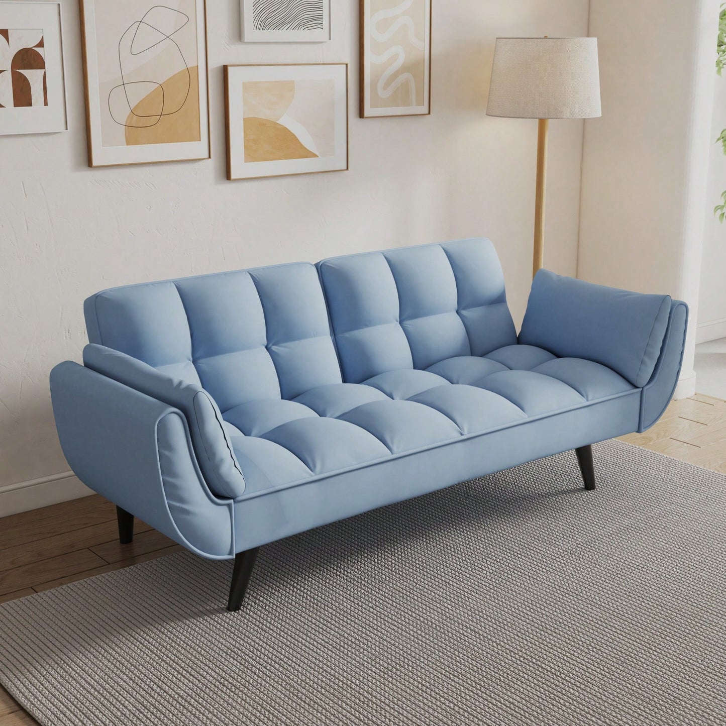 Comfortable Blue Sofa With Two Armrests And Throw Pillows For Small Spaces In Apartment Or Bedroom