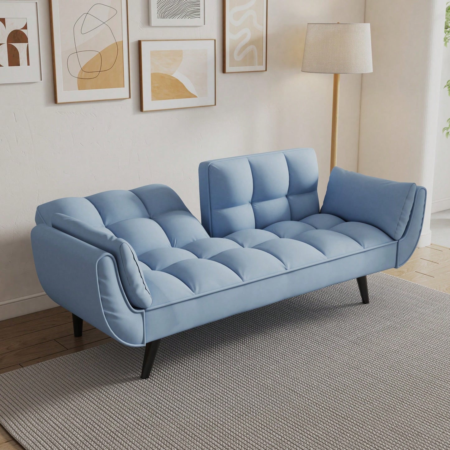 Comfortable Blue Sofa With Two Armrests And Throw Pillows For Small Spaces In Apartment Or Bedroom