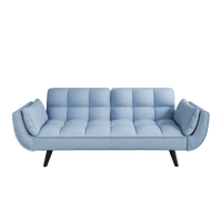 Comfortable Blue Sofa With Two Armrests And Throw Pillows For Small Spaces In Apartment Or Bedroom