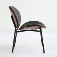 Mid-Century Modern Black Leather Lounge Chair With Walnut Finish Comfortable Backrest And Tripod Design
