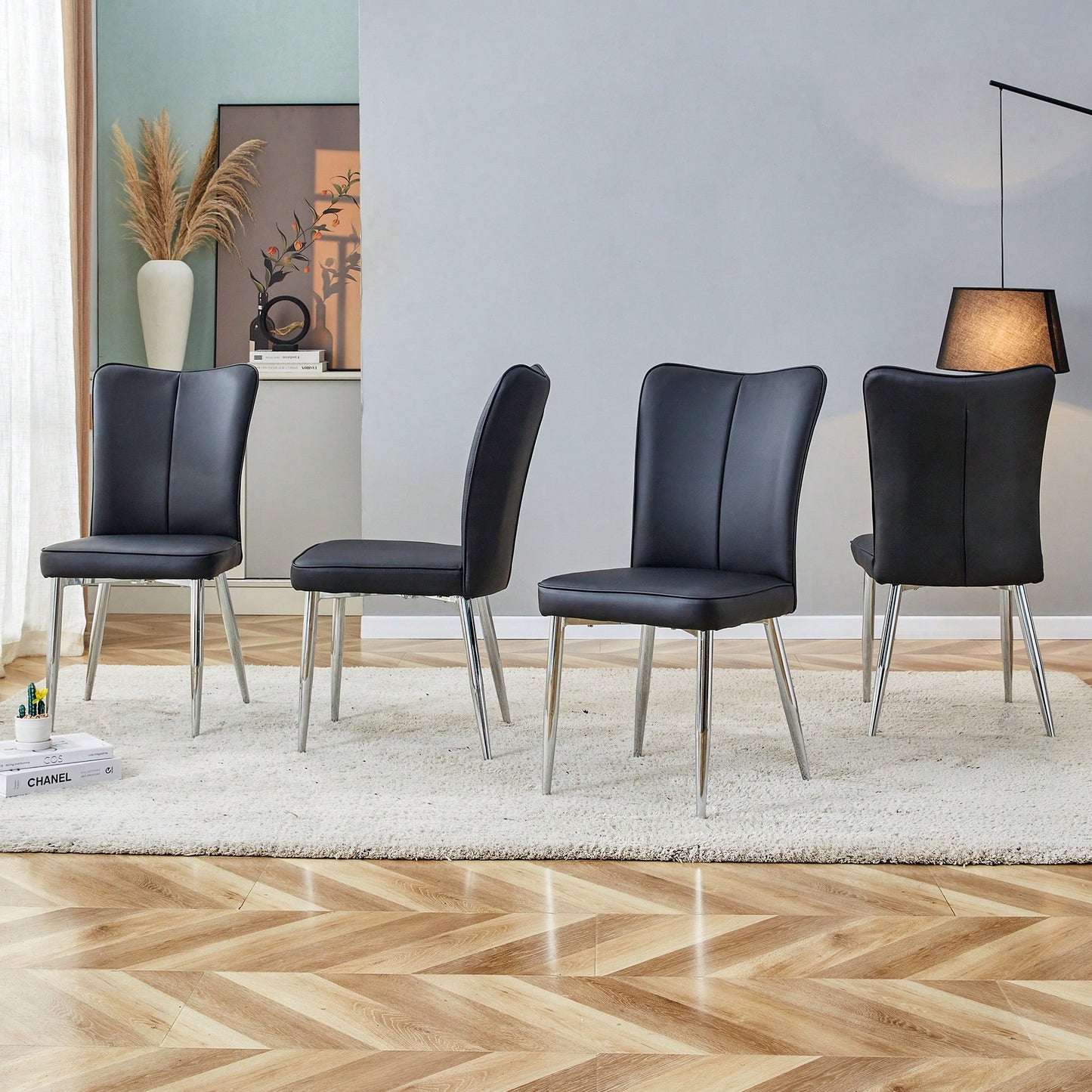 Curved Backrest Black PU Leather Dining Chairs Set Of 4 With Electroplated Metal Legs For Modern Home And Restaurant Decor